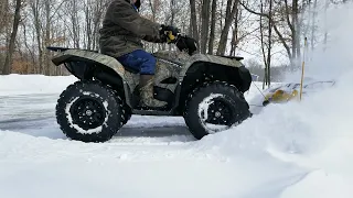 Busting some drifts with a Yamaha Grizzly 700 ATV