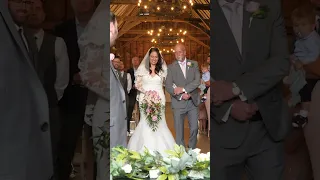 Bride walks down the aisle