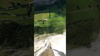 BASE jumping triple front flip😱