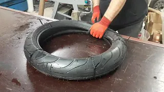 Changing a motorcycle tire with zip ties