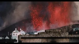 The Eldfell volcano opens on the edge of Heimaey, Iceland (Werner Herzog)