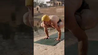 Advanced Yoga transition by the temple pond (the beanie is back)