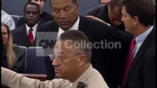 OJ SIMPSON HANDCUFFED