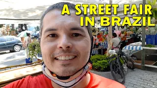 🌞 Shopping at a street fair in São Paulo, Brazil.