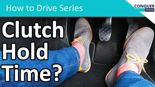 How long should you hold the clutch at the bite point when driving a manual car.