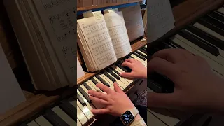 Abide with Me hymn setting on folding reed organ