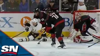 Jake Guentzel redirects Marcus Pettersson's shot home after nifty one-handed pass from Sidney Crosby