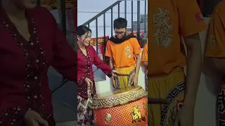 Amira playing Chinese Drum