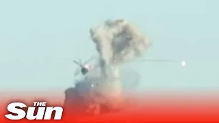 Russian attack helicopter is blown out of the sky by Ukrainian forces