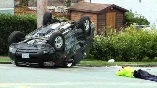 CAR CRASH ROLL OVER AT 4 AVE & 11 ST MAR 8 2012 BY BCNEWSVIDEO