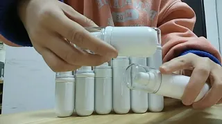 unique shape empty white airless pump bottles cosmetic packaging with round bottom and clear cap