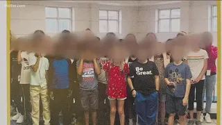 Parents claim photo in yearbook show students making racist gesture