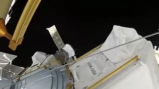 Astronaut repairing a part of ISS