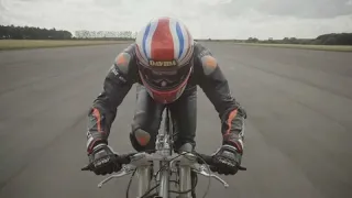 Briton Neil Campbell breaks speed world record, cycling at 174mph