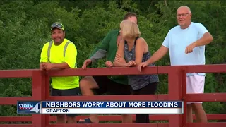 Rising Milwaukee River floods Grafton