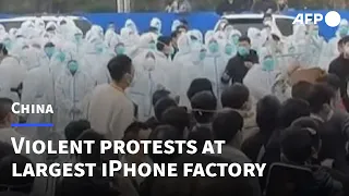 Violent protests at largest iPhone factory in China | AFP