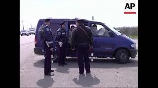 4:3 Barricades along Odessa shore, police checkpoint at entrance to city