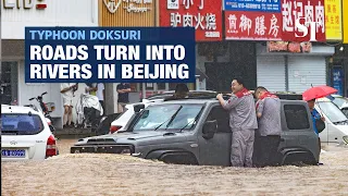 Roads turn to rivers in Beijing after typhoon