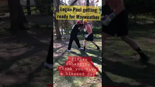 Logan Paul pad work getting ready for Floyd Mayweather