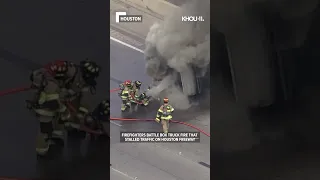 Firefighters battle box truck fire on Houston freeway