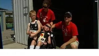 A brother's love: Boy takes sib for triathlon ride!