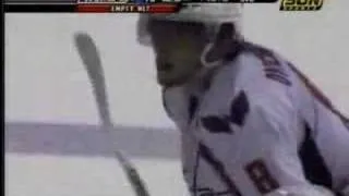 Alexander Ovechkin makes a save on an empty net