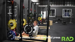 Floor seated barbell overhead press