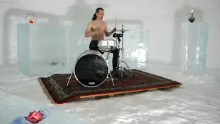 Playing drums in an IGLU to Estas Tonne's song Fusion