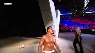 Alberto Del Rio throws John Cena through the stage