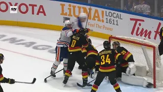 Canucks Vs Oilers Scrum, Connor McDavid Gets Away With Cross Check