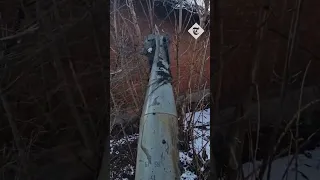 Ukrainians casually walk past massive unexploded bomb in Avdiivka