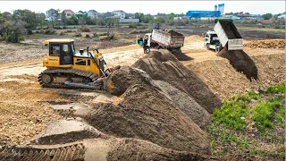 New project!! sand filling up power shantui dozer pushing clearing sand dump truck unloading sand.