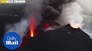 Stunning footage of smoke and lava spilling out of La Palma volcano