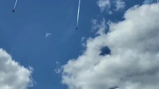 Red arrows, high Break maneuver coming out of the clouds