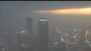 Time-Lapse Of Snow Squall Atop John Hancock Tower In Boston