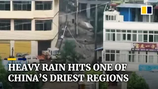 Torrential rains slam China’s normally dry Gansu province, trapping over 10,000 people