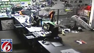 Surveillance video shows SUV smash through Orlando GameStop during burglary