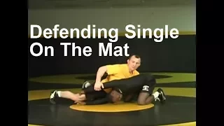 Defending Single Leg on Mat Opponent Locks Hands High Leg Over