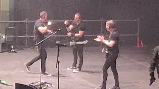 Mark Tremonti gives away to a child his guitar during the concert (Milano 25/11/22)