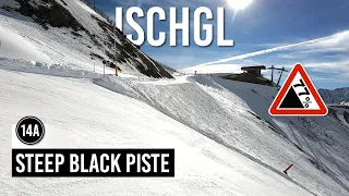 Skiing steep black piste 14a in Ischgl Samnaun
