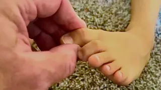 Foot reflexology massage for children. How to massage a child foot. Brandon massaging Ellie