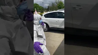 Daughter put on hazmat suit to give her dad a hug on his 78th Bday.