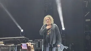 Robert Smith leaves the stage with gift from a fan. The Cure 5-21-2023 San Diego