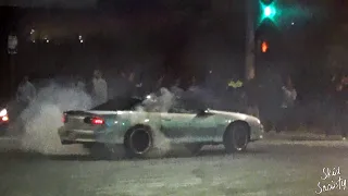 Cars Doing Donuts Takeover an Intersection