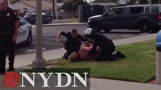 Video allegedly shows cop punch woman during arrest