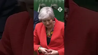 Theresa May hugs Ian Blackford before farewell speech