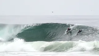 Surfing a SUPER FAST beach break.