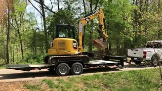 Loading Cat 305.5e2 on Gatormade tilt trailer