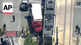 Metro train collides with bus in downtown Los Angeles, injuring more than 50