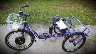 Трехколесный электрический велосипед для взрослых.